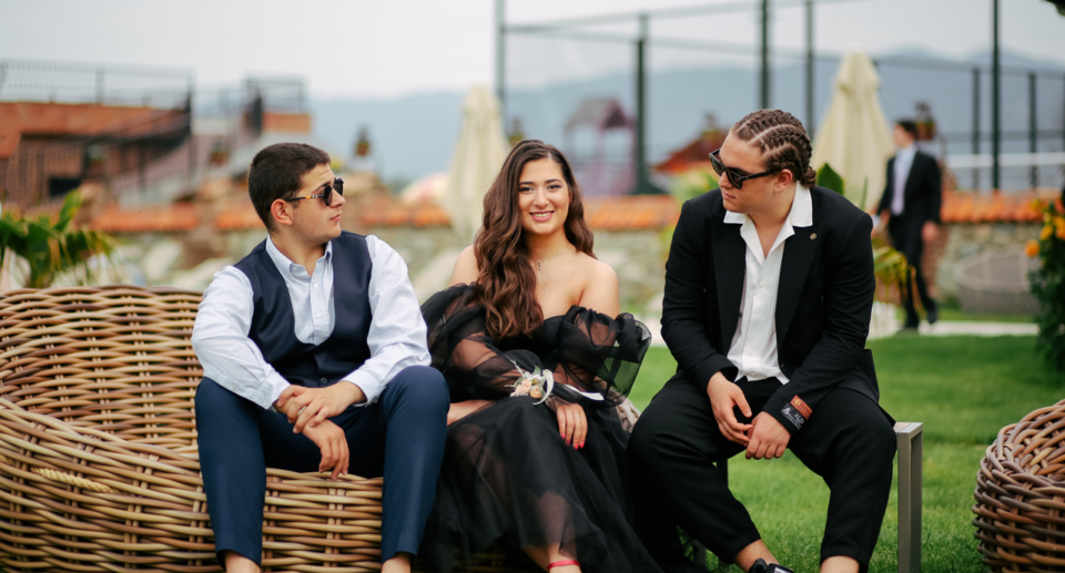 What to wear to a wedding: guests in formal dresses and suits
